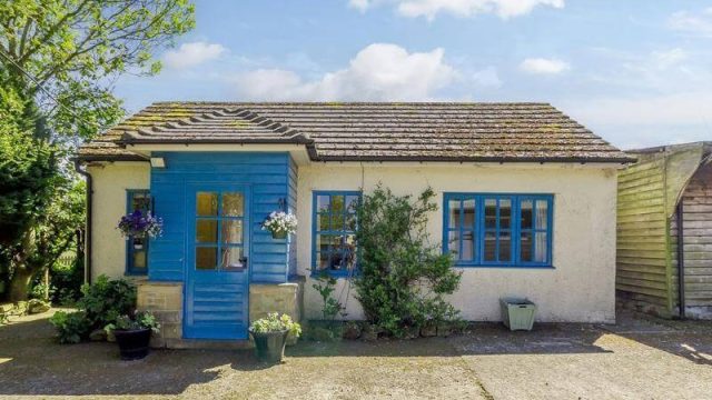 Small cottage with blue paintwork