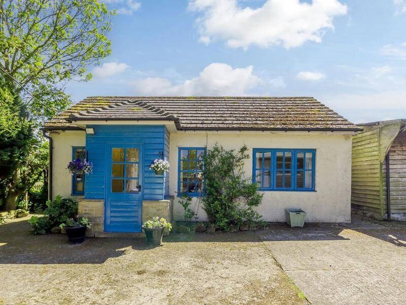 Small cottage with blue paintwork