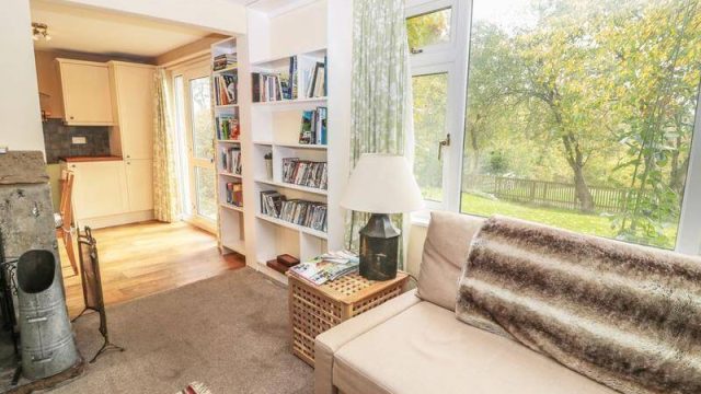 Room interior with window onto garden