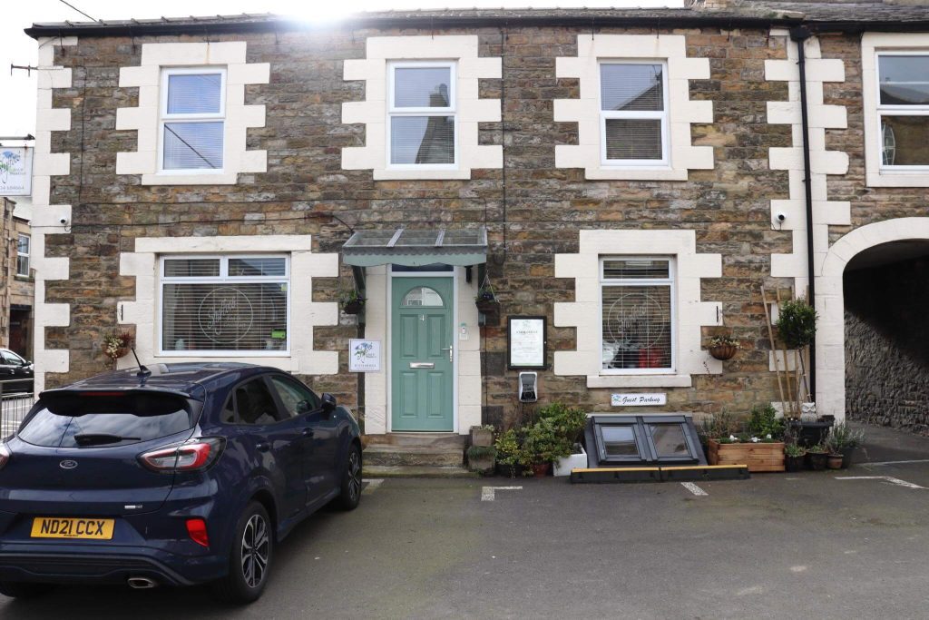 House with parked car