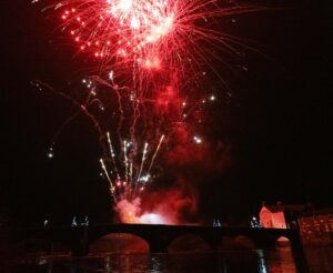 Fireworks over a bridge